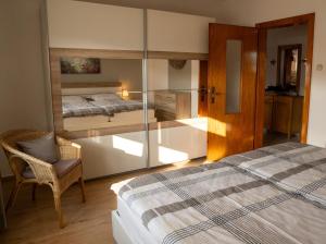 Ένα ή περισσότερα κρεβάτια σε δωμάτιο στο Jahnstraße 37 - Ferienwohnung Hufnagel