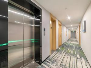 Galería fotográfica de GreenTree Inn Express Qingdao Jiaodong International Airport en Li-ko-chuang