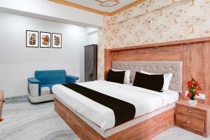 Postel nebo postele na pokoji v ubytování Collection O Digha Ghat Formerly Hotel Shahnai