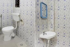 Hotel O Malavli Lonavala في لونافالا: حمام مع مرحاض ومغسلة +23 صورة