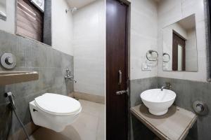 Ванная комната в Hotel O Sur Sagar Lakeview Vadodara Formerly Vintage Inn