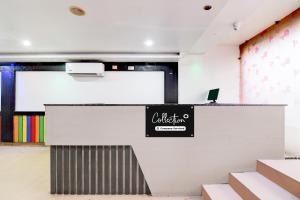 an office with a sign on the wall at Collection O Dattapukur Railway Terminal Kolkata in Bārāsat