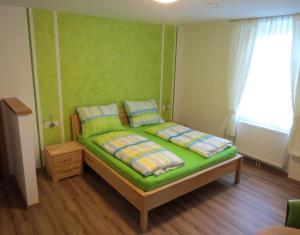 Ein Bett oder Betten in einem Zimmer der Unterkunft Gasthof Christine Enne