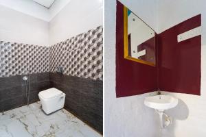 a bathroom with a toilet and a sink at Collection O Sirkazhi Formerly Navagiraga Resort in Vaithīsvarankoil