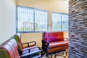 Χώρος καθιστικού στο Collection O Panikhaiti Railway Station Formerly Brahmaputra View Guest House