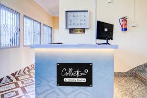 Μια τηλεόραση ή/και κέντρο ψυχαγωγίας στο Collection O Panikhaiti Railway Station Formerly Brahmaputra View Guest House