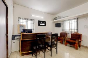 Η κουζίνα ή μικρή κουζίνα στο Super Collection O Mappedu Chennai Formerly Nitas Business Hotel