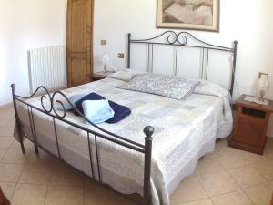 Ένα ή περισσότερα κρεβάτια σε δωμάτιο στο Agriturismo Podere Bellosguardo +38 φωτογραφίες