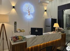 Μια τηλεόραση ή/και κέντρο ψυχαγωγίας στο Sazara Hotel Batu