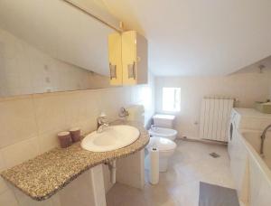 Kúpeľňa v ubytovaní Apartment Sunce