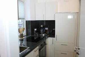 Kuchyň nebo kuchyňský kout v ubytování Vlotho Apartment