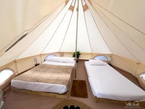 Ένα ή περισσότερα κρεβάτια σε δωμάτιο στο Villa Verde