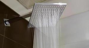a shower in a bathroom with a shower curtain at 7 Days Premium Nanjing Gaochun Beiling Road Branch in Gaochun +105 photos