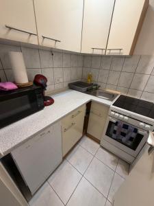 Η κουζίνα ή μικρή κουζίνα στο Your Second Home6 Feel like Home