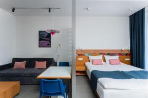 Postel nebo postele na pokoji v ubytování RIS Dalma Collection Yerevan