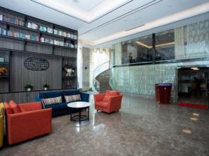 Гостиная зона в Kyriad Marvelous Hotel Xiangyin Bus Station