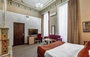 TV a/nebo společenská místnost v ubytování Boutique Garden De Baku