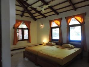 Postel nebo postele na pokoji v ubytování Eva Lanka Hotel - Beach & Wellness + 37 fotografií