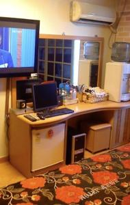 TV a/nebo společenská místnost v ubytování Gunsan Eldorado + 3 fotografie