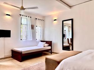 Postel nebo postele na pokoji v ubytování Nest Villas