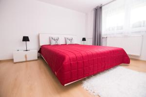 Postel nebo postele na pokoji v ubytování Apartament Zacisze Tatr