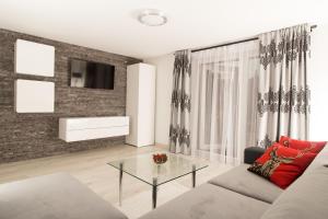 Posteľ alebo postele v izbe v ubytovaní Apartament Zacisze Tatr