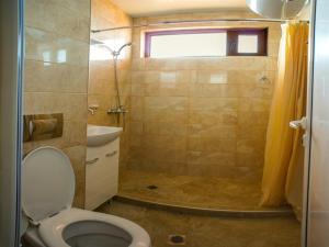 a bathroom with a toilet and a sink at Villa Maria in Tsarevo +87 photos