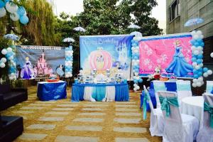 arozen birthday party with arozen theme and a stage at Royaute Luxury Suites and Hotel Gulberg Lahore in Lahore