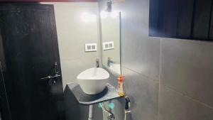 Koupelna v ubytování Palm Breeze