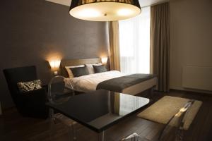 Postel nebo postele na pokoji v ubytování Hotel FIS Jasná