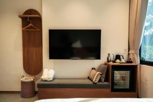 Μια τηλεόραση ή/και κέντρο ψυχαγωγίας στο Than Coffee & Homestay