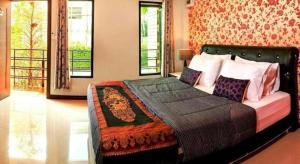 Ένα ή περισσότερα κρεβάτια σε δωμάτιο στο The Prince Hotel