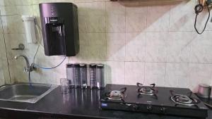 Kuchyň nebo kuchyňský kout v ubytování Tomato home stay