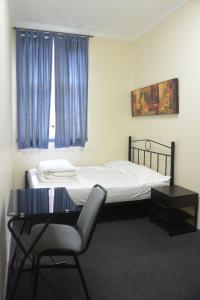 Postel nebo postele na pokoji v ubytování Elizabeth Hostel