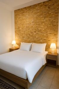 Postel nebo postele na pokoji v ubytování Rainbow Street Studio Cozy Central + 15 fotografií