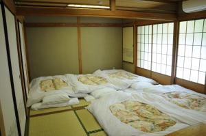 Postel nebo postele na pokoji v ubytování Hotel Terrace Yokohama