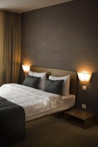 Postel nebo postele na pokoji v ubytování Hotel FIS Jasná
