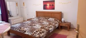 Postel nebo postele na pokoji v ubytování Kunterbunt Seehaus