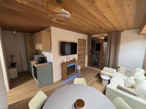 Kuchyň nebo kuchyňský kout v ubytování Appartement au pied des pistes