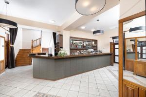 Η κουζίνα ή μικρή κουζίνα στο Svájci Lak Panzió