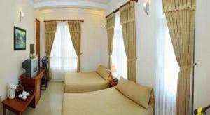 TV/trung tâm giải trí tại Gold Night Hotel