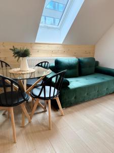 Posezení v ubytování Villa Kaplowa Chata & SPA