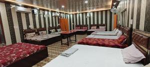 Postel nebo postele na pokoji v ubytování Shree Raghav Homestay + 8 fotografií