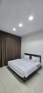 Postel nebo postele na pokoji v ubytování سويت جميل وانيق