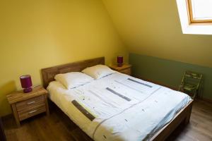 Postel nebo postele na pokoji v ubytování Maison A Colombage De 1602