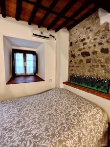 Кровать или кровати в номере Claudia's Home La Suite