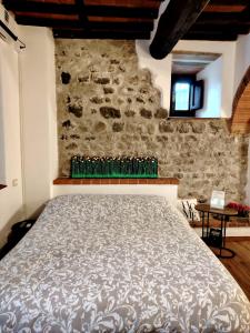 Кровать или кровати в номере Claudia's Home La Suite