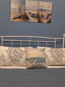 Postel nebo postele na pokoji v ubytování MaMmaRosa Ortigia, historic city of Syracuse