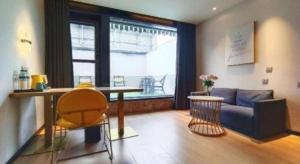 Posezení v ubytování Magnotel Shenyang Consulate Qingnian Street