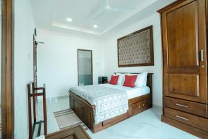 Ένα ή περισσότερα κρεβάτια σε δωμάτιο στο Sea View 3-Bedroom Residence Greenstar City Dehiwala by Luminor +5 φωτογραφίες